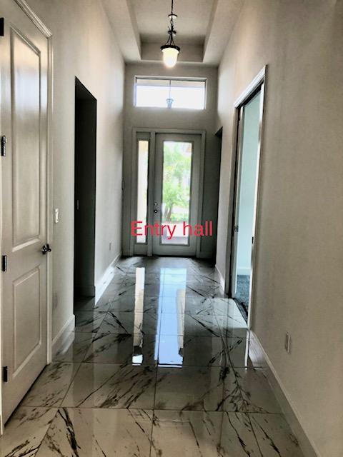 11670 Southwest Sailfish Isles Way Port St. Lucie, FL 34987 - Photo 15 of 25 a living room with furniture and a window