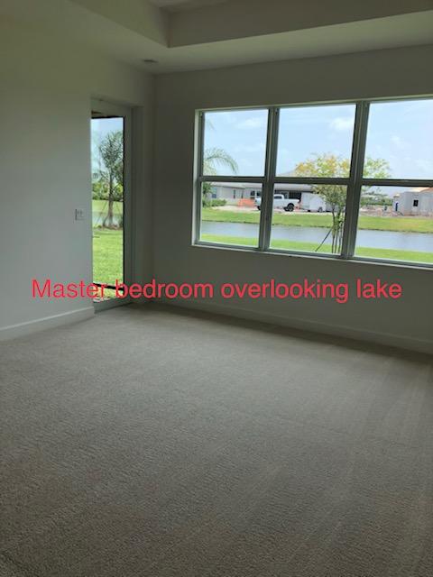 11670 Southwest Sailfish Isles Way Port St. Lucie, FL 34987 - Photo 16 of 25 an view of an empty room with window
