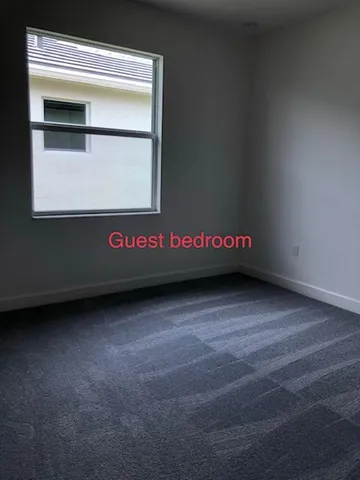 an empty room with a large window