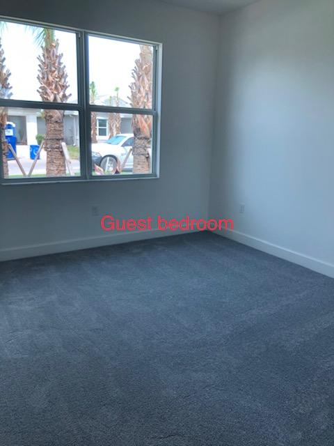 11670 Southwest Sailfish Isles Way Port St. Lucie, FL 34987 - Photo 21 of 25 an empty room with a large window