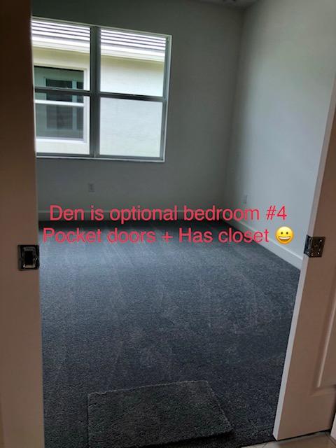 11670 Southwest Sailfish Isles Way Port St. Lucie, FL 34987 - Photo 22 of 25 a close up of a wall with a window