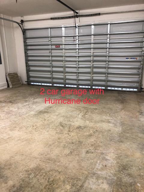 11670 Southwest Sailfish Isles Way Port St. Lucie, FL 34987 - Photo 24 of 25 a view of a room with racks on the wall