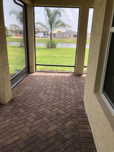 11670 Southwest Sailfish Isles Way Port St. Lucie, FL 34987 - Photo 5 of 25 a view of a room with a large window