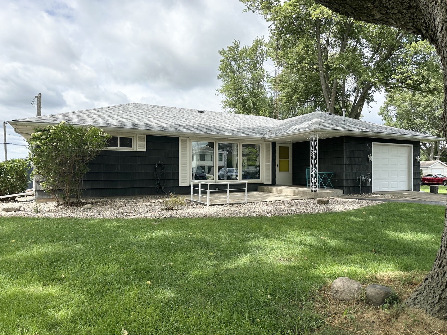 3150 River Road Kankakee, IL 60901 - Photo 1 of 40 a view of a house with a yard and sitting area