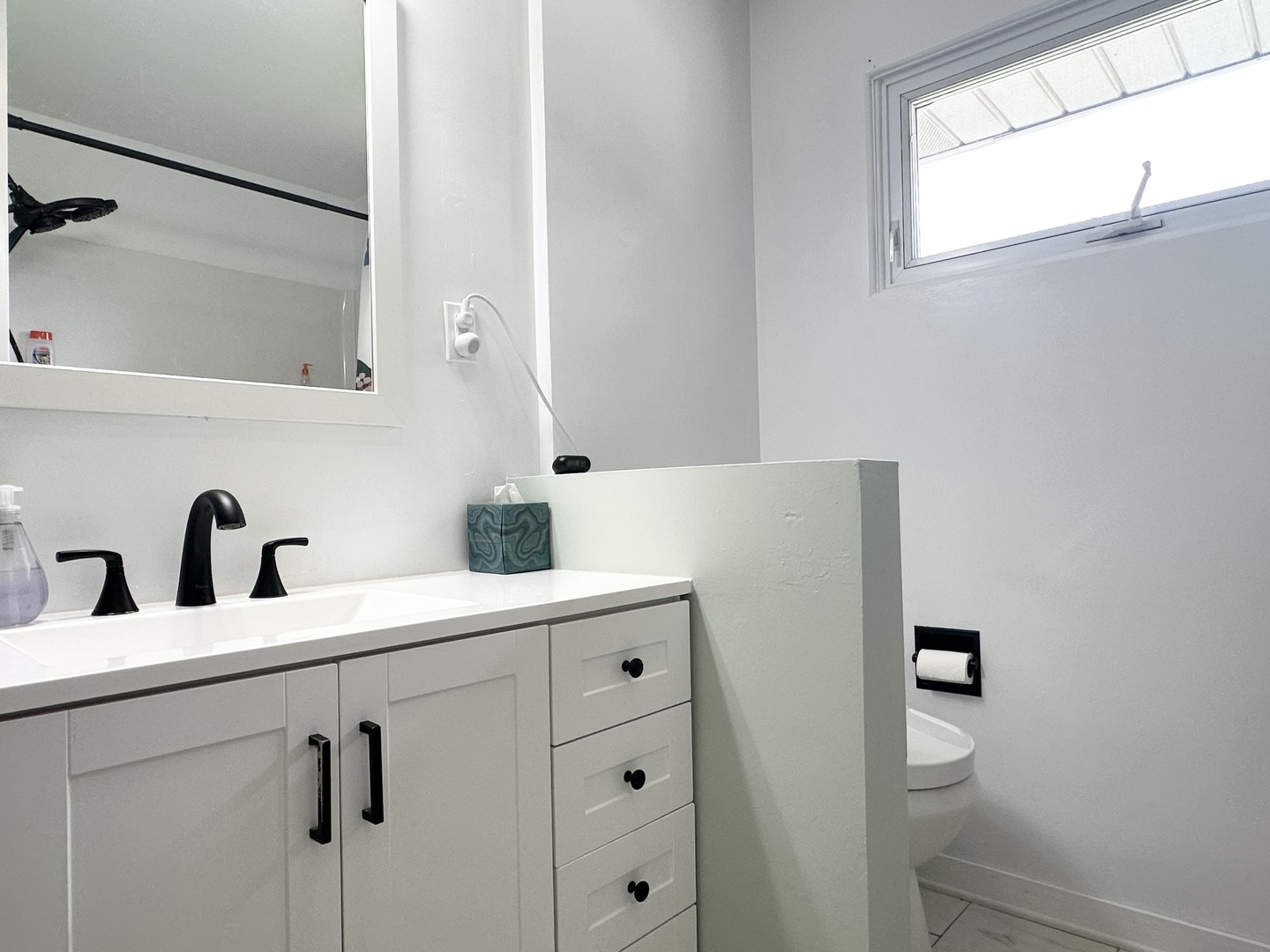 3150 River Road Kankakee, IL 60901 - Photo 18 of 40 a bathroom with a sink and a mirror