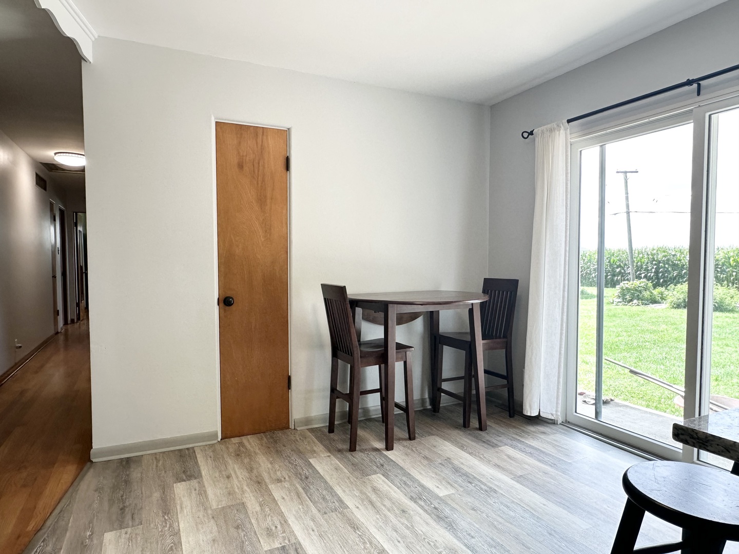 3150 River Road Kankakee, IL 60901 - Photo 10 of 40 a view of a room with wooden floor lounge chair and windows