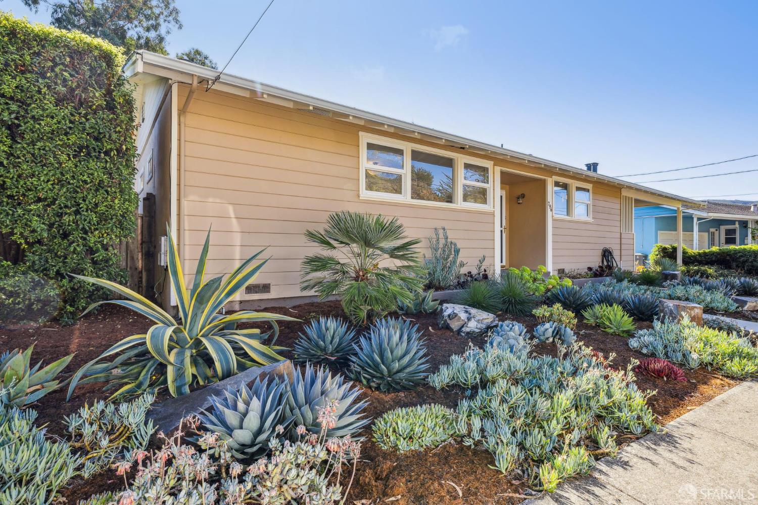 796 Alta Vista Drive Pacifica, CA 94044 - Photo 1 of 1 a front view of house with small garden