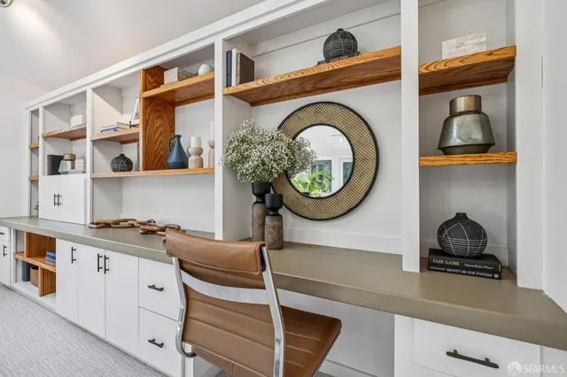 a kitchen with a cabinets and a stove