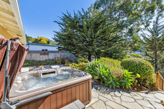 a view of a porch with seating space