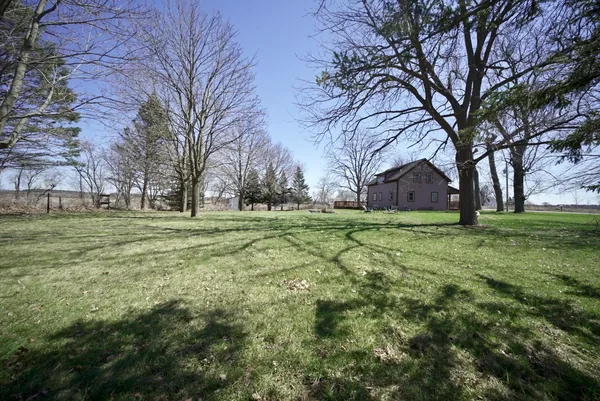 a view of a backyard with a garden