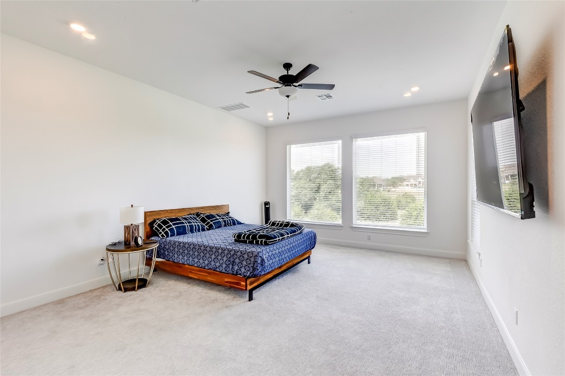 462 Old Stone Road Austin, TX 78737 - Photo 24 of 39 a living room with furniture and a ceiling fan