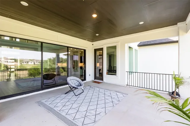 a view of a house with a swimming pool