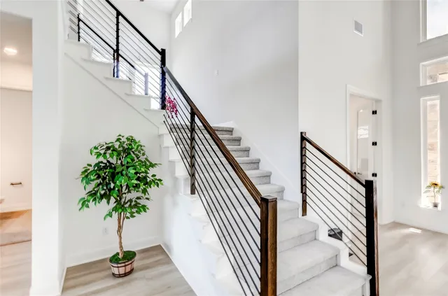 a view of entryway with wooden floor