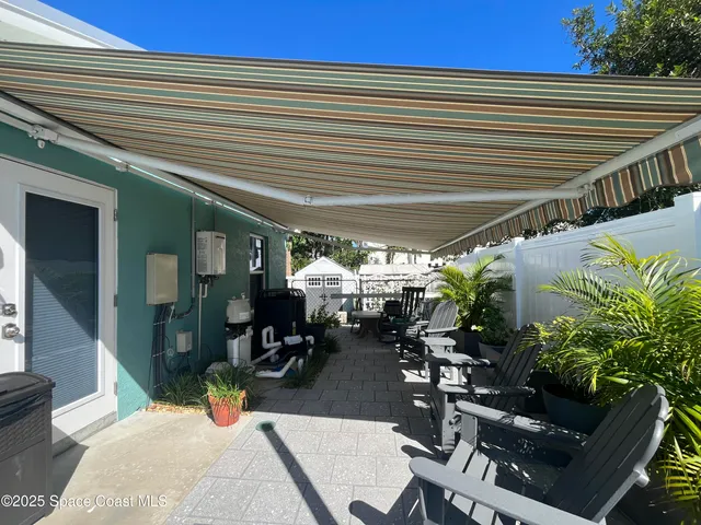 an outdoor space with furniture