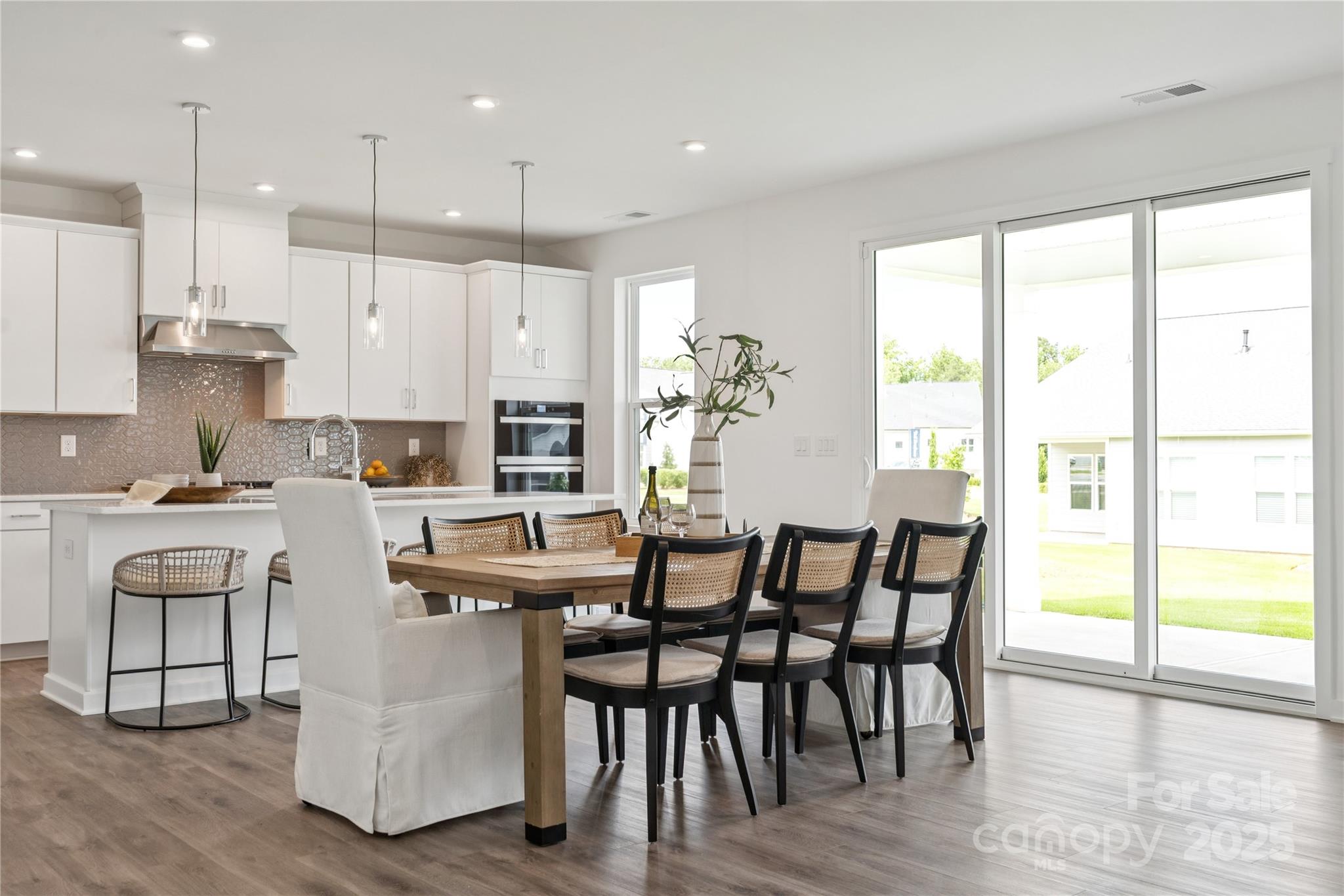 5348 Vernon Rdg Road, Unit 111 Huntersville, NC 28078 - Photo 5 of 14 a kitchen with counter top space and appliances