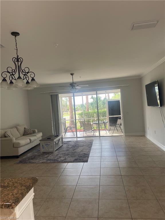 884 Hampton Circle, Unit 159 Naples, FL 34105 - Photo 3 of 28 a living room with furniture