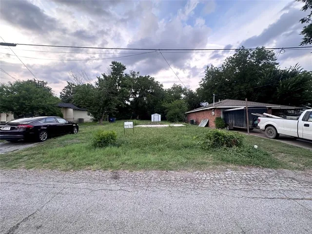 a car parked in front of a house
