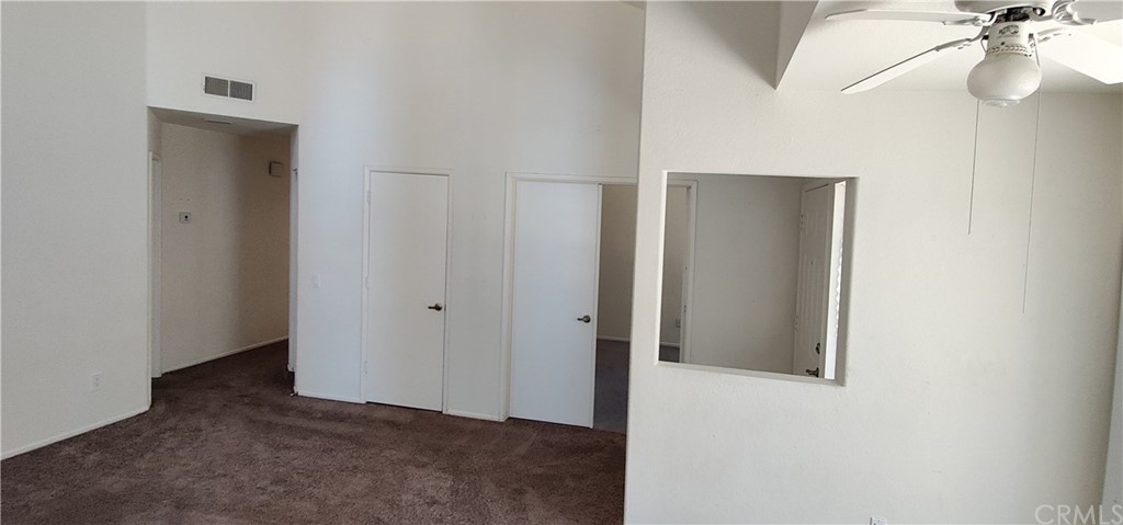 31586 Paseo De Las Olas Temecula, CA 92592 - Photo 4 of 14 a view of a hallway with closet