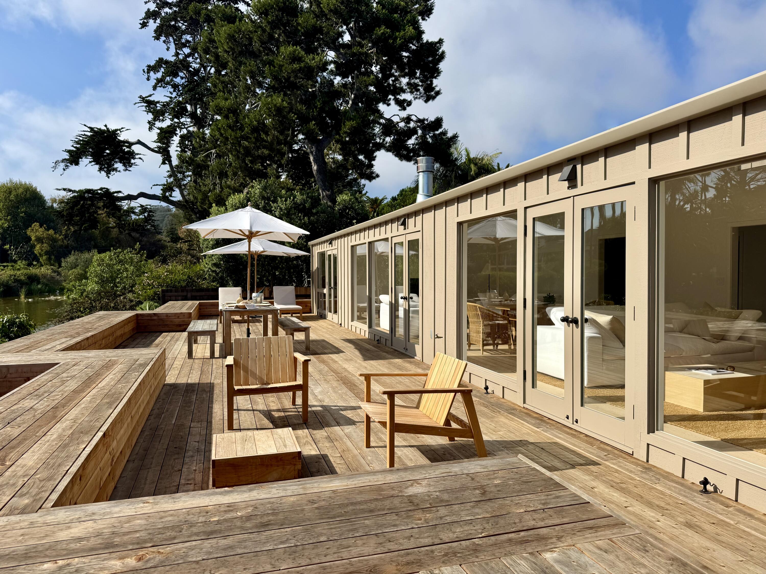 8132 Puesta Del Sol Carpinteria, CA 93013 - Photo 12 of 13 a view of house with patio outdoor seating and city view