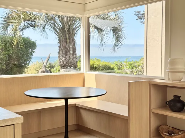 a room with a table and chairs