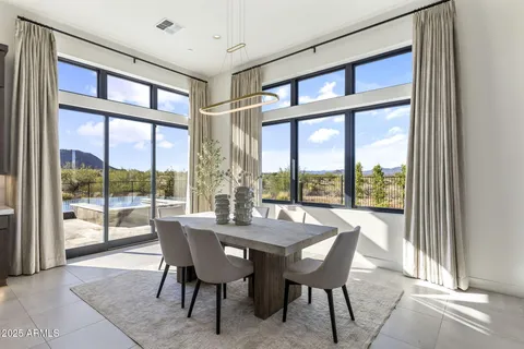 a bathroom with a granite countertop sink mirror and shower