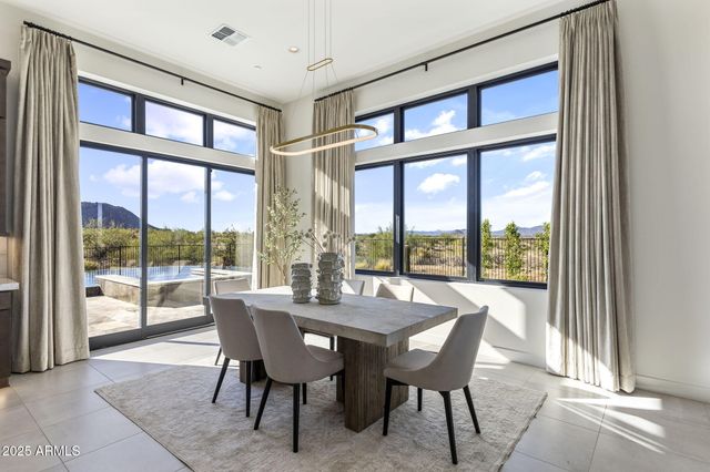 a bathroom with a granite countertop sink mirror and shower