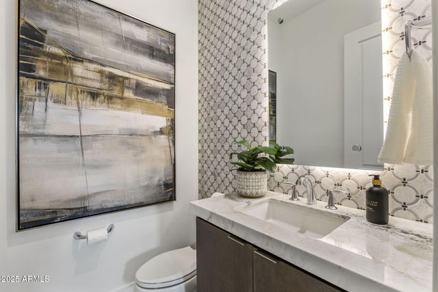 a view of a livingroom with a flat screen tv