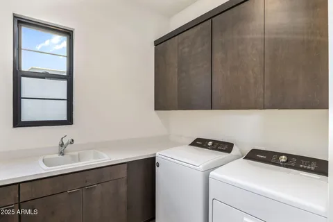 a view of a patio with swimming pool table and chairs