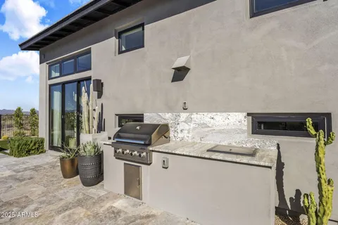a living room with lots of furniture and a fireplace