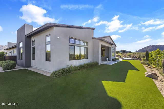 a view of a swimming pool with a lake view