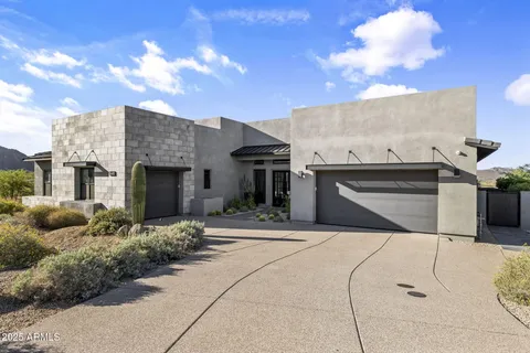 a outdoor living space with patio furniture and potted plants