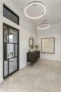 a kitchen with granite countertop a stove and a sink