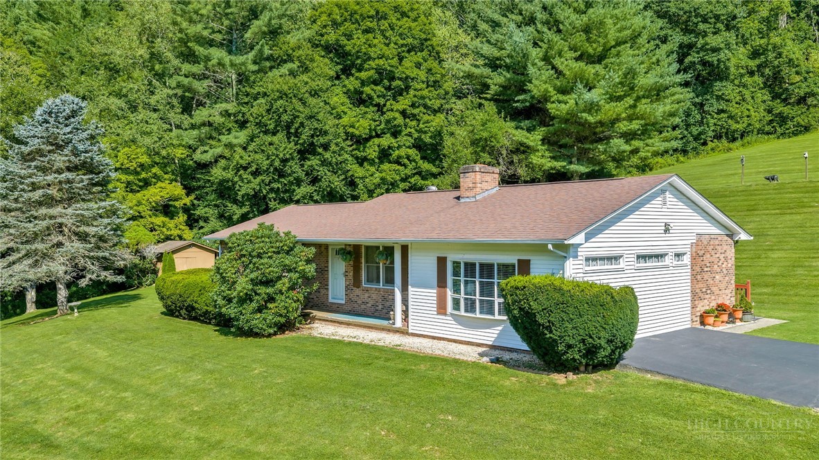 420 Roaring Fork Road Creston, NC 28615 - Photo 1 of 46 Gallery Image 1
