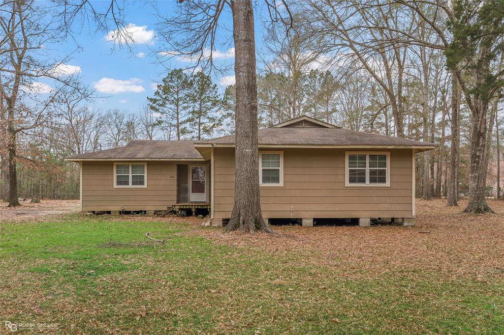 158 Edwards Road Doyline, LA 71023 - Photo 23 of 28 a view of a house with a yard