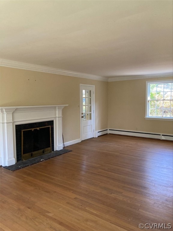 8909 Tolman Road Henrico, VA 23229 - Photo 4 of 25 Crown dentil moulding, oak hardwood floor, Wood Burning Fireplace.
