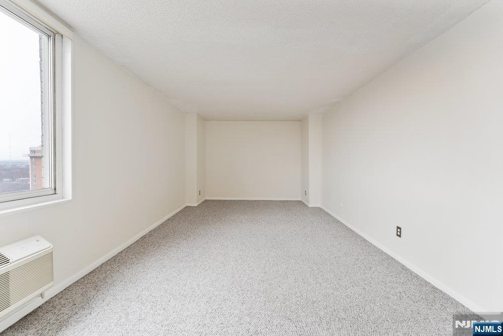 160 Overlook Avenue, Unit 20D Hackensack, NJ 07601 - Photo 17 of 22 an empty room with a window