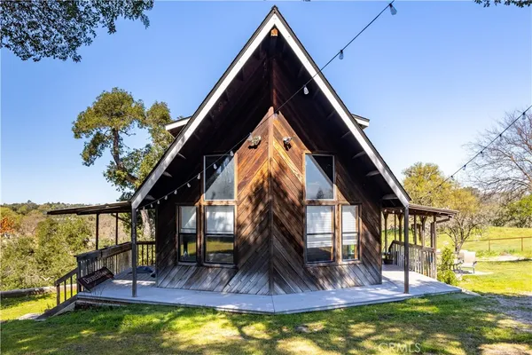 a view of swimming pool with a yard