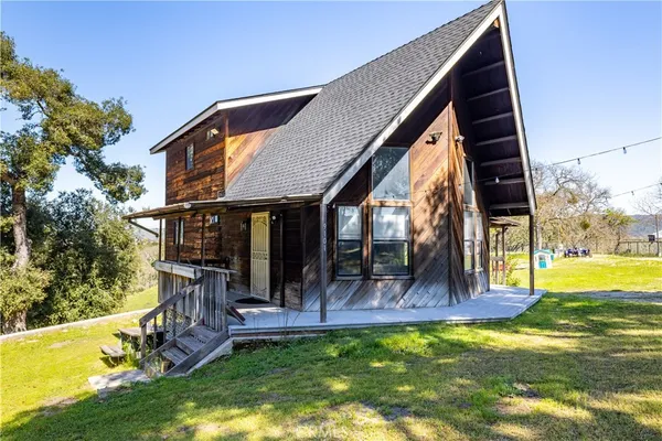 a view of a house with a swimming pool