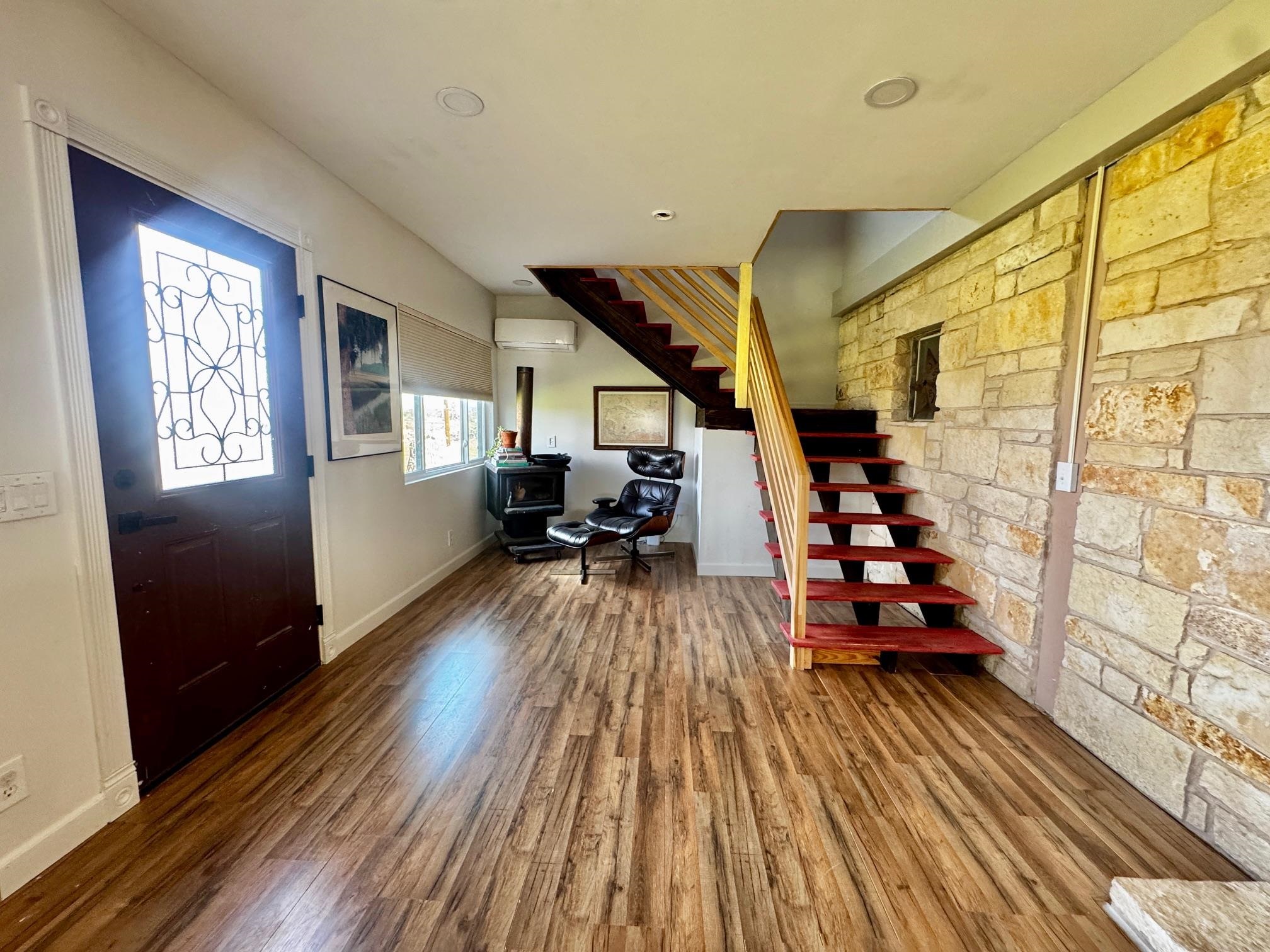 6410 Gray Road Valley Spring, TX 76885 - Photo 12 of 31 a living room with furniture and a wooden floor