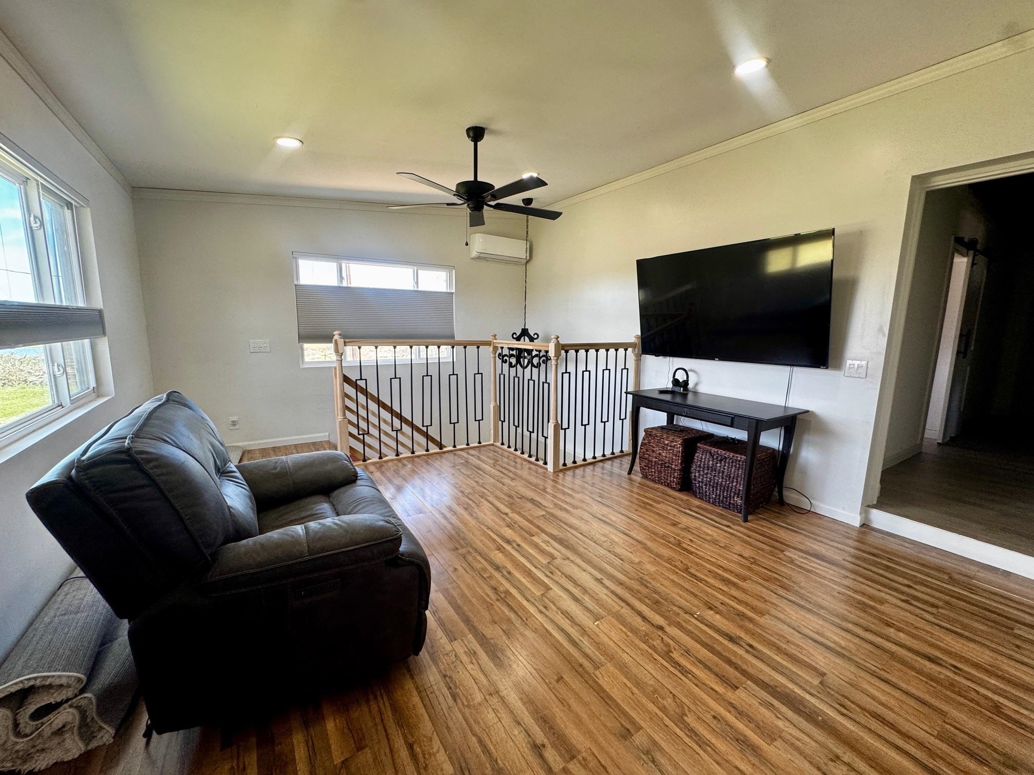 6410 Gray Road Valley Spring, TX 76885 - Photo 13 of 31 a living room with furniture and a flat screen tv