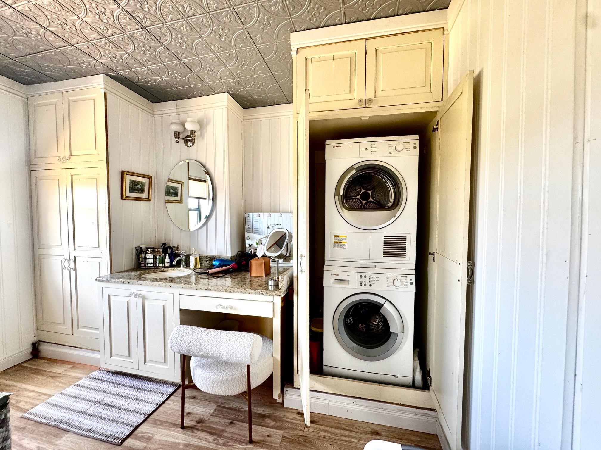 6410 Gray Road Valley Spring, TX 76885 - Photo 17 of 31 a view of a kitchen and a sink washer and dryer