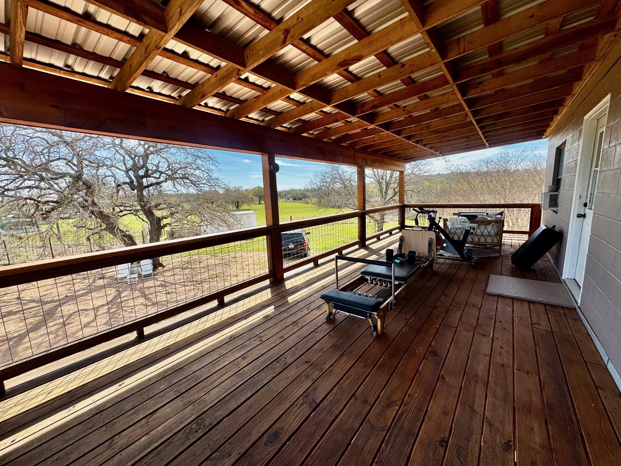6410 Gray Road Valley Spring, TX 76885 - Photo 19 of 31 a view of two chairs in wooden deck