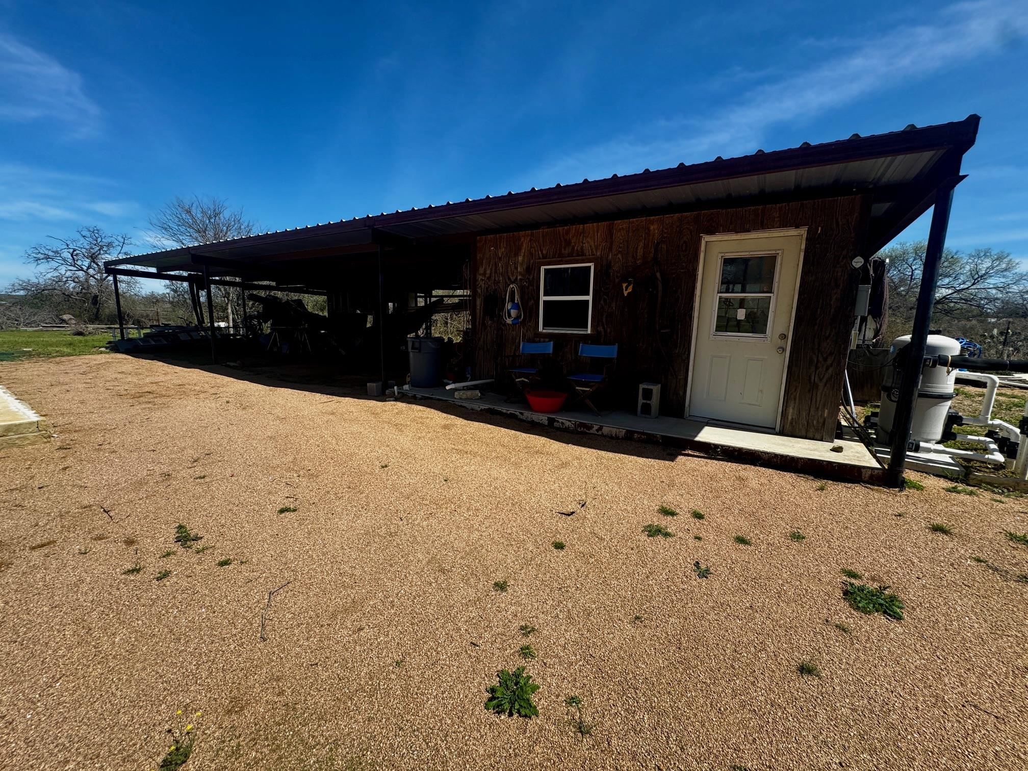 6410 Gray Road Valley Spring, TX 76885 - Photo 23 of 31 a black car parked in front of house