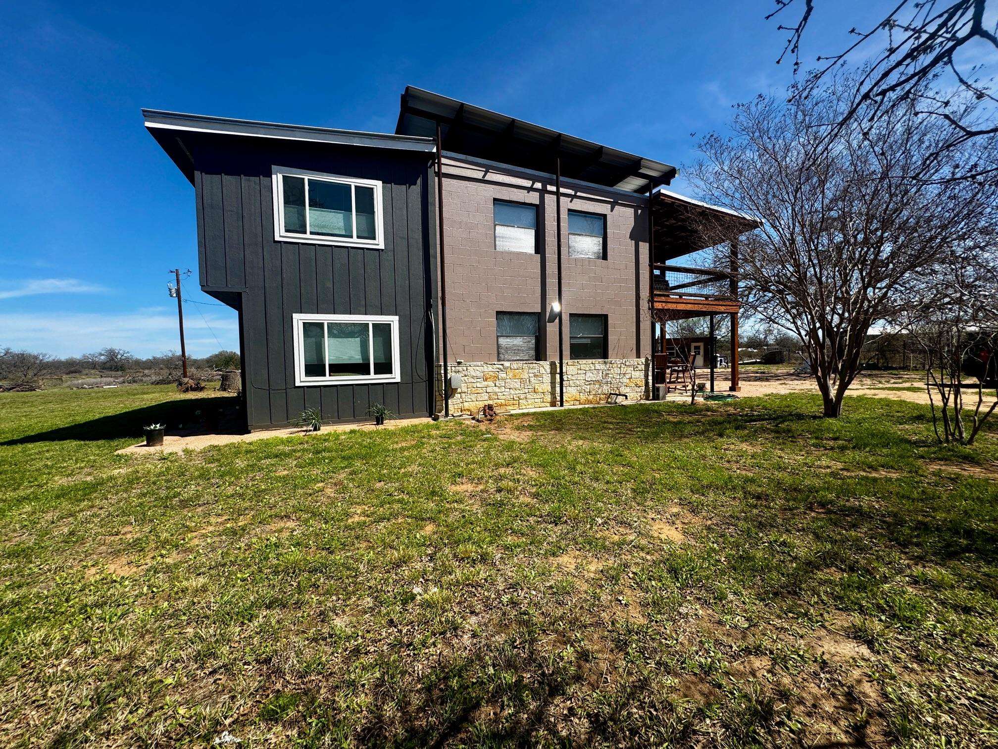6410 Gray Road Valley Spring, TX 76885 - Photo 25 of 31 a front view of a house with a yard