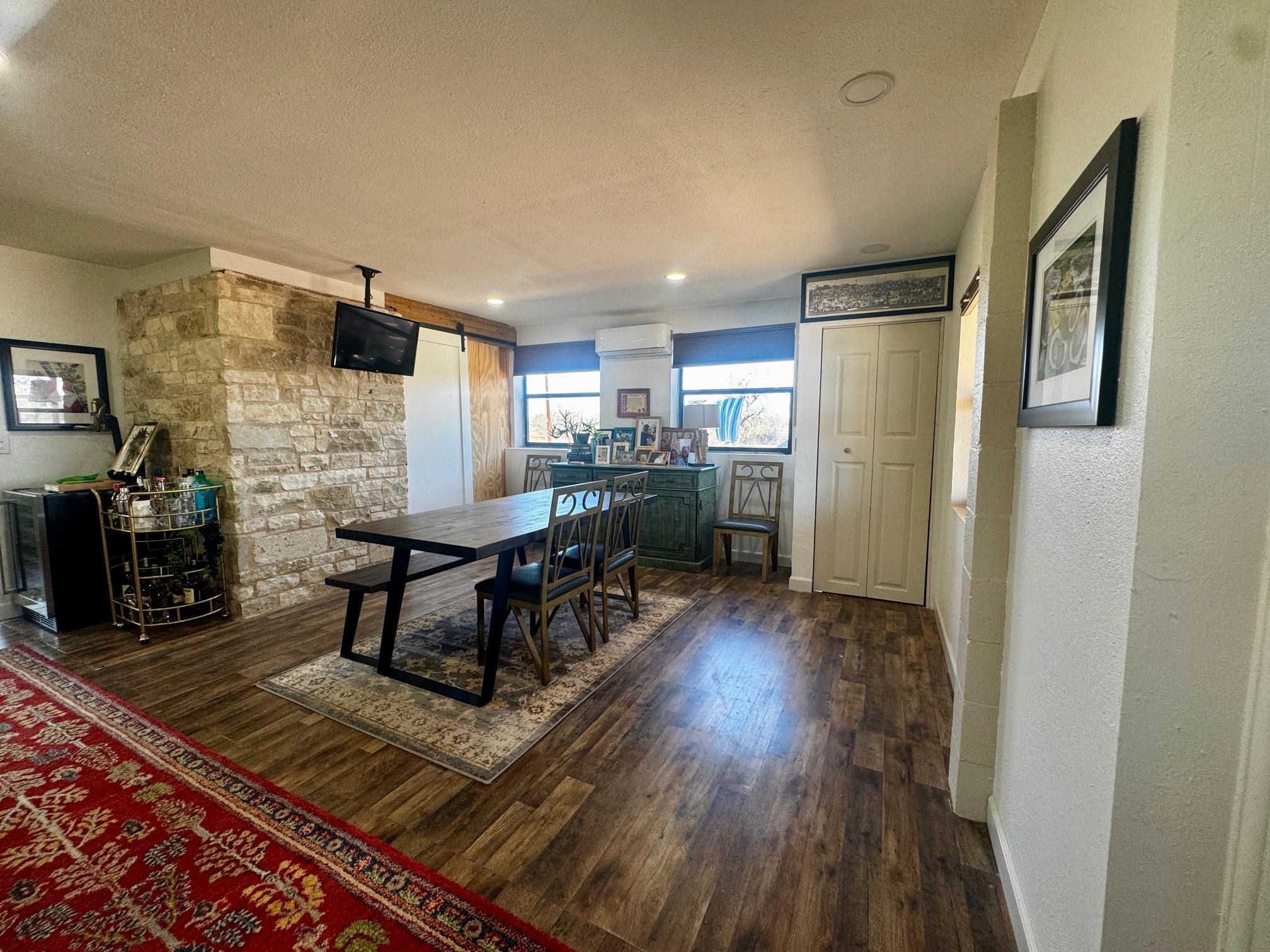6410 Gray Road Valley Spring, TX 76885 - Photo 3 of 31 a living room with furniture and a fireplace