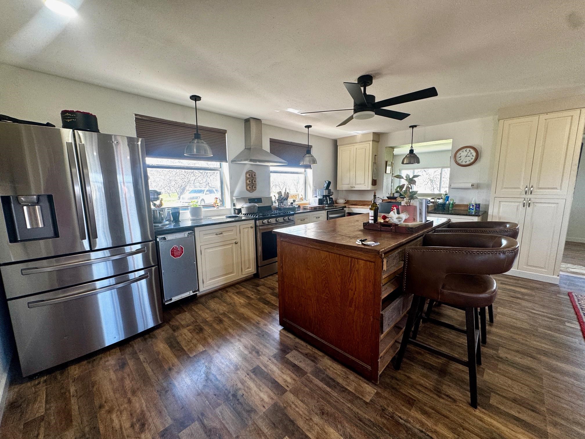 6410 Gray Road Valley Spring, TX 76885 - Photo 6 of 31 a kitchen with granite countertop a sink appliances and cabinets