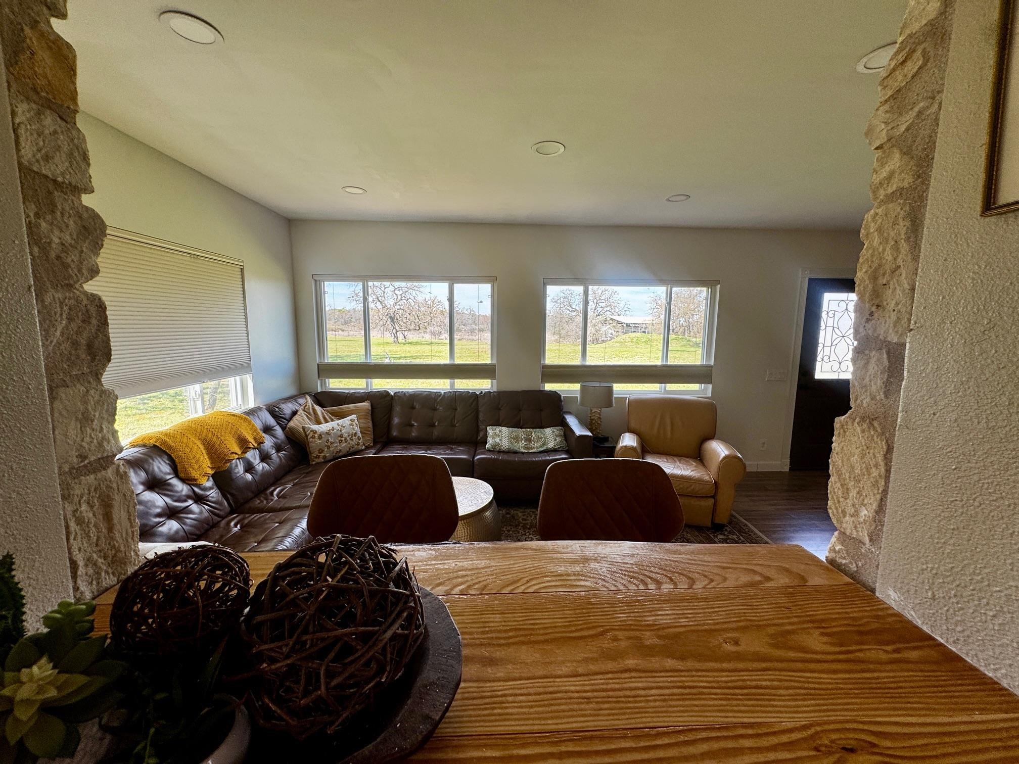 6410 Gray Road Valley Spring, TX 76885 - Photo 8 of 31 a living room with furniture and a large window