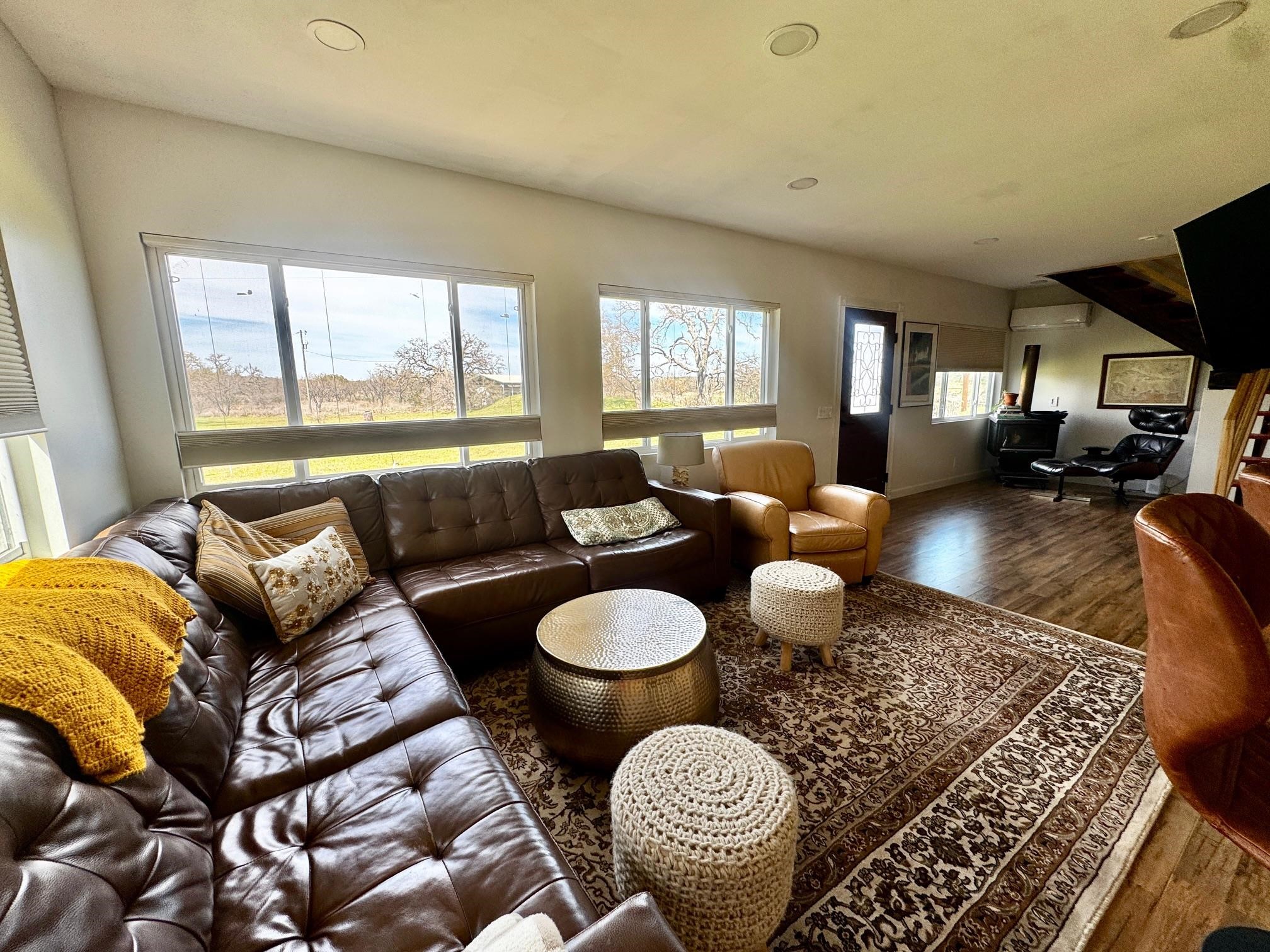 6410 Gray Road Valley Spring, TX 76885 - Photo 9 of 31 a living room with furniture and a large window