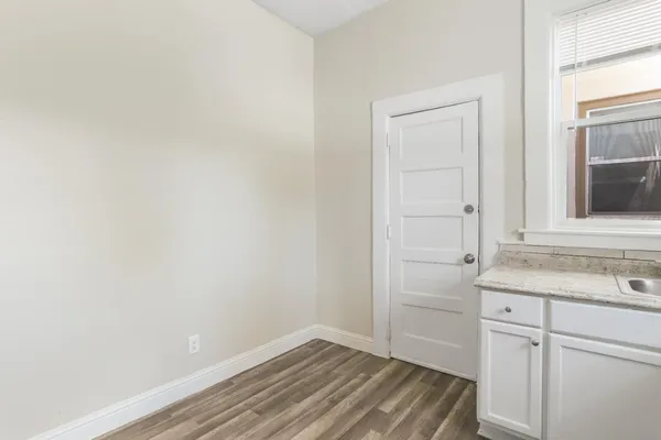 a kitchen with a stove and a microwave