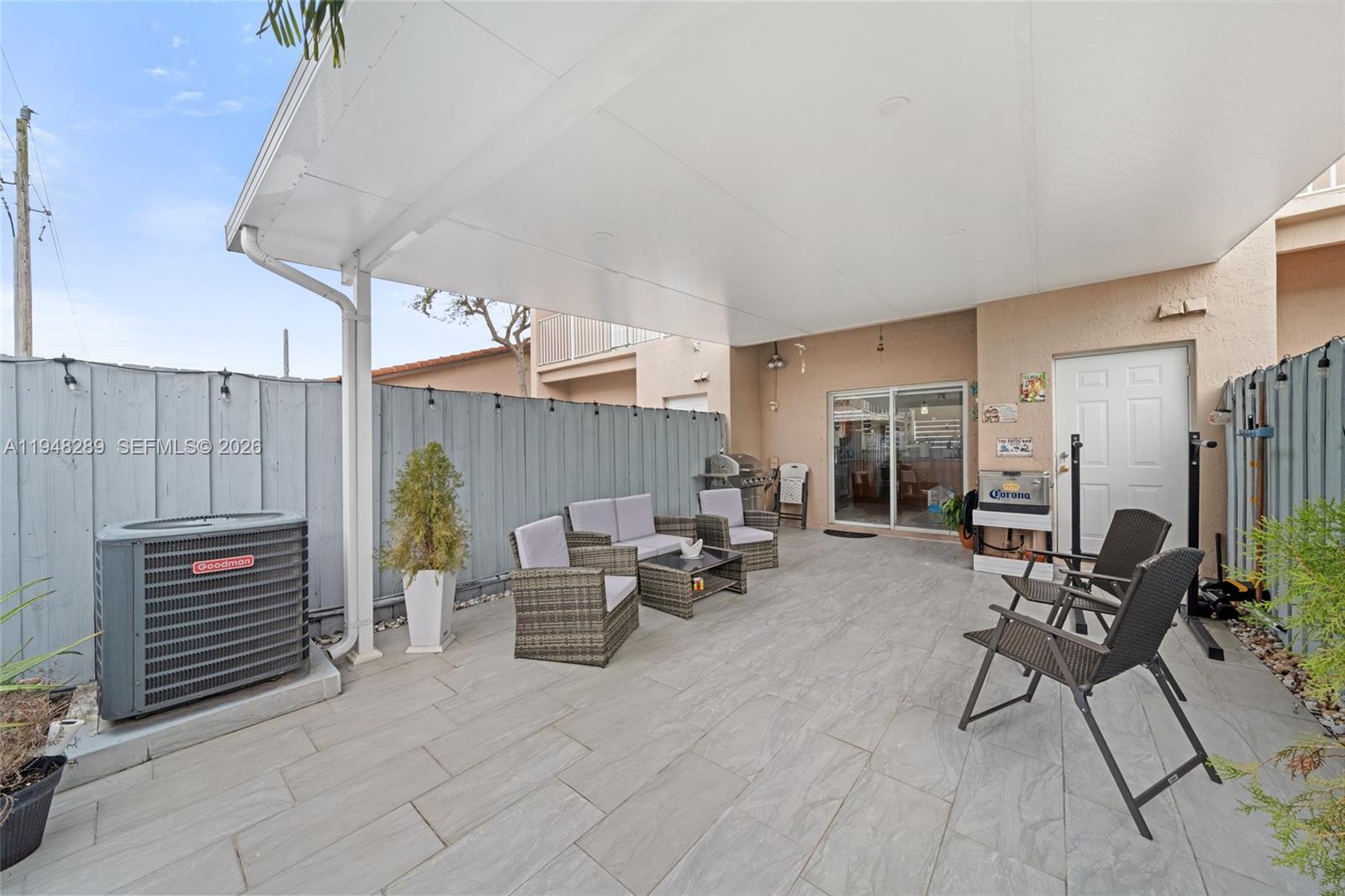 13770 Southwest 170th Lane Miami, FL 33177 - Photo 12 of 24 a living room with furniture a table and chairs